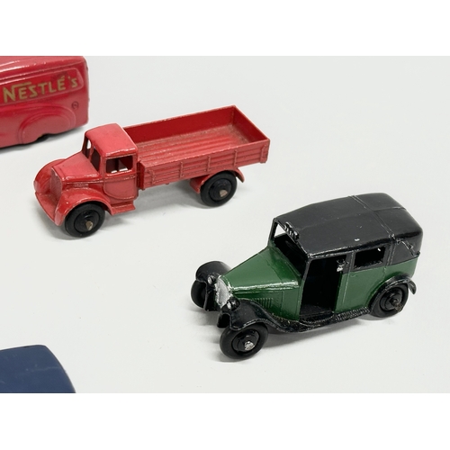 410 - A collection of vintage Dinky model cars.