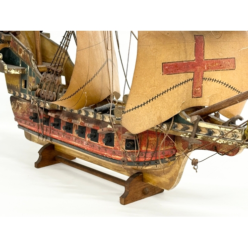 8 - A good quality Early 20th Century ‘The Golden Hind’ model ship. With metal cannons, anchors and hind... 