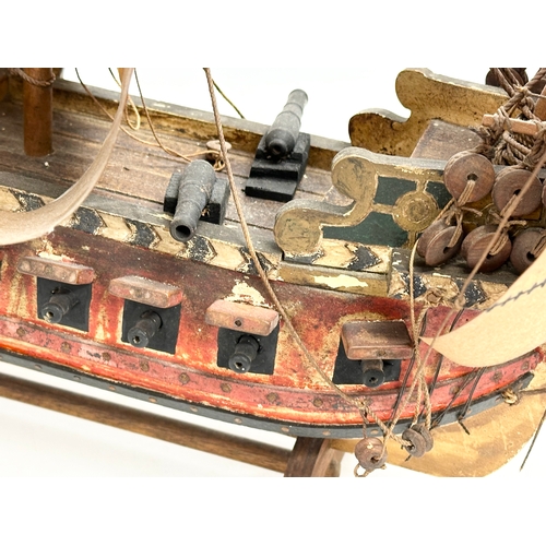 8 - A good quality Early 20th Century ‘The Golden Hind’ model ship. With metal cannons, anchors and hind... 