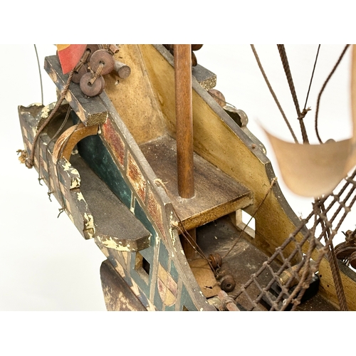 8 - A good quality Early 20th Century ‘The Golden Hind’ model ship. With metal cannons, anchors and hind... 