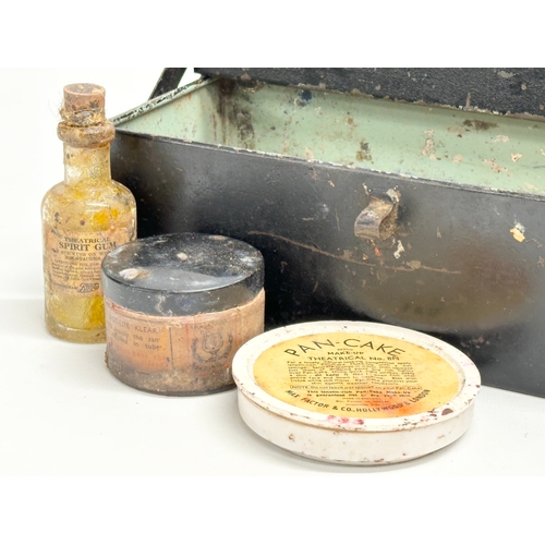 27 - A Late 19th/Early 20th Century Theatrical makeup sets in Gamages of London tin. Leichner, Max Factor... 