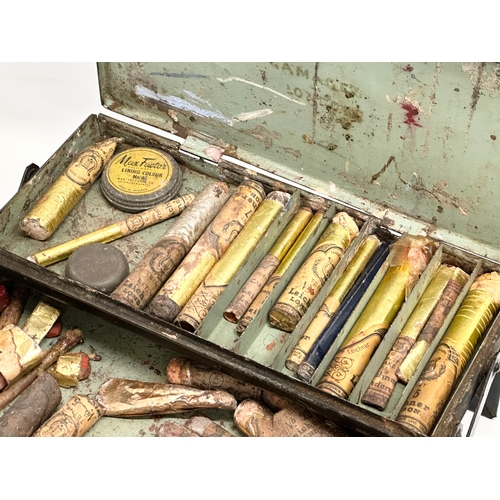 27 - A Late 19th/Early 20th Century Theatrical makeup sets in Gamages of London tin. Leichner, Max Factor... 