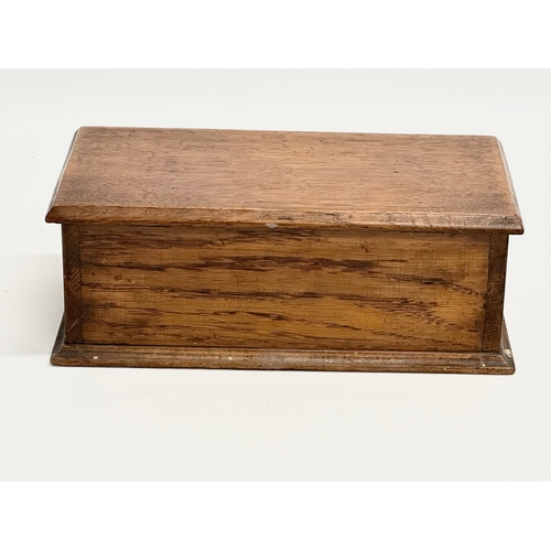 56 - An Early 20th Century oak watchmakers chest. 23x12x9cm