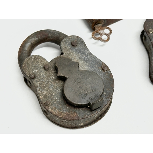 29 - 4 Victorian heavy padlocks with an Early 20th Century Yale padlock. Improved Patent Tumbler etc. 11c... 