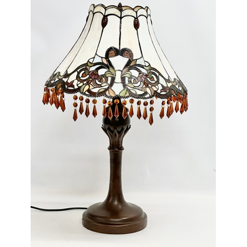 104 - A large Tiffany style table lamp with amber glass droplets. 44x70cm