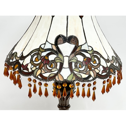 104 - A large Tiffany style table lamp with amber glass droplets. 44x70cm