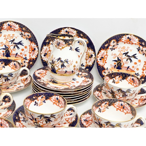 124 - A 27 piece 19th Century Imari tea service.