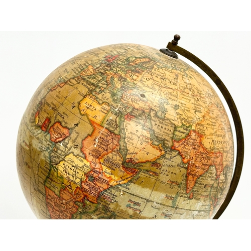 31 - A 1920’s Geographia 8inch Terrestrial Globe. Geographia LTD, London. 39.5cm