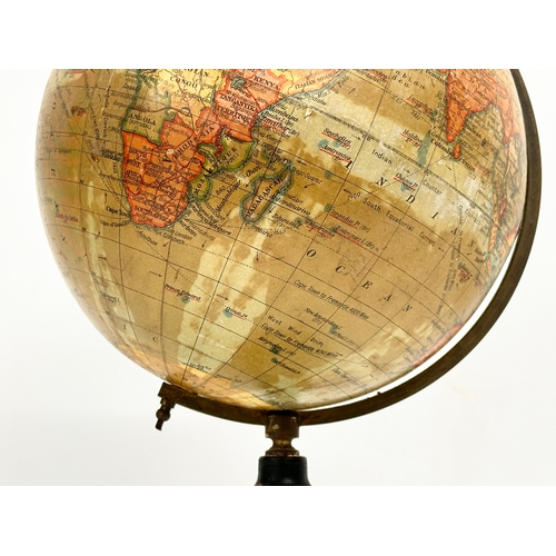 31 - A 1920’s Geographia 8inch Terrestrial Globe. Geographia LTD, London. 39.5cm