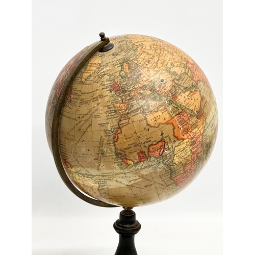 31 - A 1920’s Geographia 8inch Terrestrial Globe. Geographia LTD, London. 39.5cm