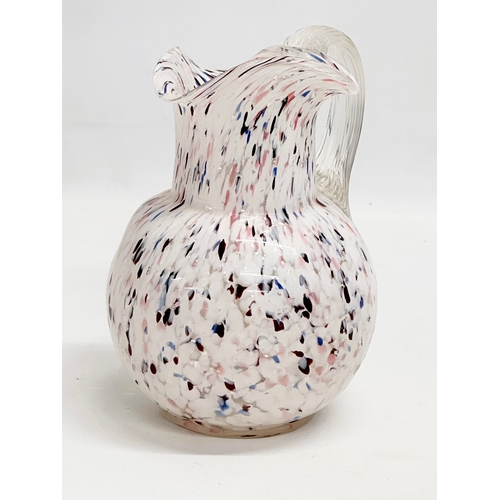 127 - A Late 19th Century Bohemian Spatter Glass jug. 13x12x17cm