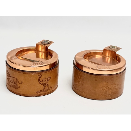 105 - A pair of South African Durban Lines ships copper and leather bound ashtrays. 11.5x13x8cm