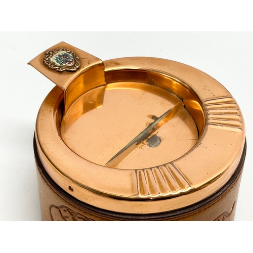 105 - A pair of South African Durban Lines ships copper and leather bound ashtrays. 11.5x13x8cm