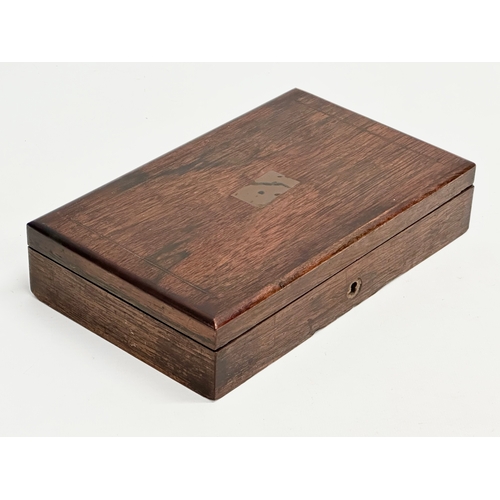 123 - A Victorian rosewood desktop box. 23.5x14.5x5cm