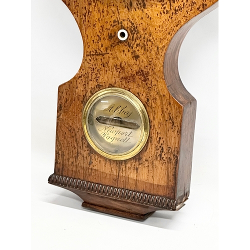 65 - A George IV rosewood barometer. 98cm