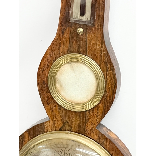 65 - A George IV rosewood barometer. 98cm