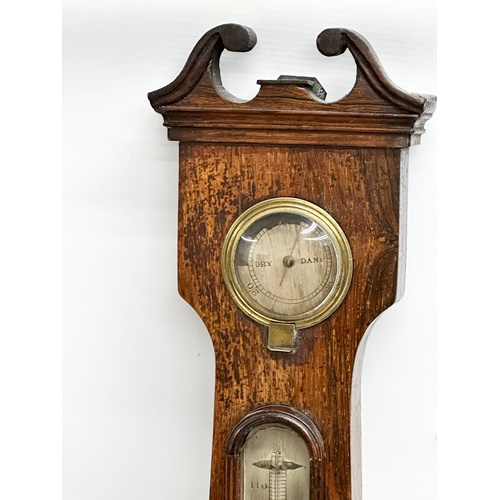 65 - A George IV rosewood barometer. 98cm