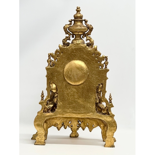 38 - A large 18th Century style French gilt mantle clock. 35x20x59cm