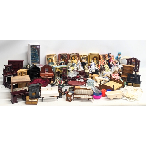 663 - A large collection of vintage doll house furniture, including dolls, accessories, etc.