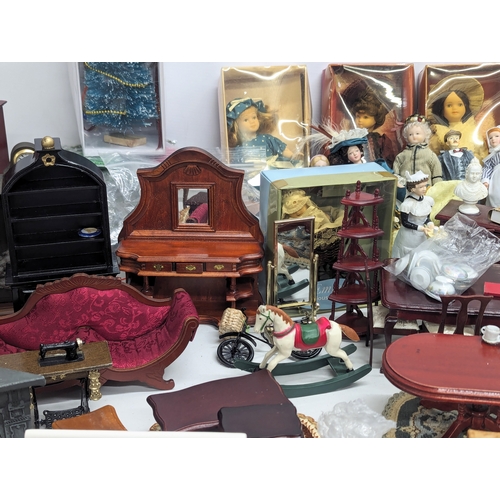 663 - A large collection of vintage doll house furniture, including dolls, accessories, etc.