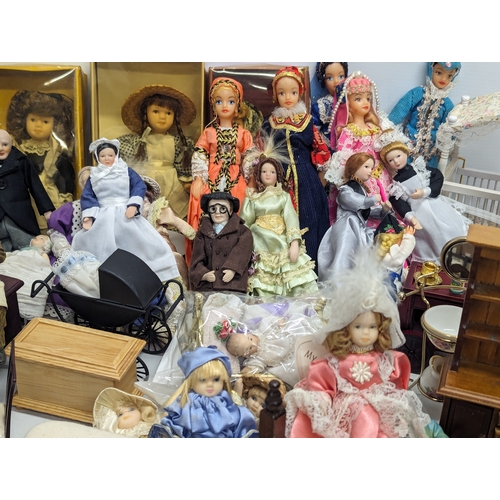 663 - A large collection of vintage doll house furniture, including dolls, accessories, etc.