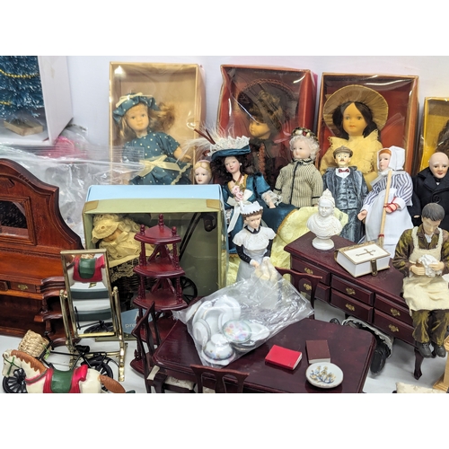 663 - A large collection of vintage doll house furniture, including dolls, accessories, etc.