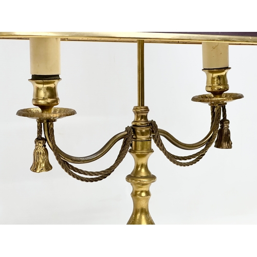 660 - A brass table lamp with draped rope design. 38x28x58cm