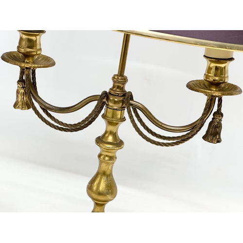 660 - A brass table lamp with draped rope design. 38x28x58cm