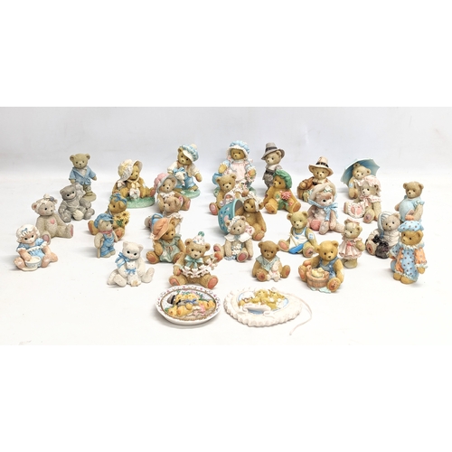 667 - A collection of Cherished Teddies figures. Priscilla Hillman.