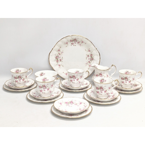 673 - A Paragon 'Victoriana Rose' pottery tea service, including cake plate.