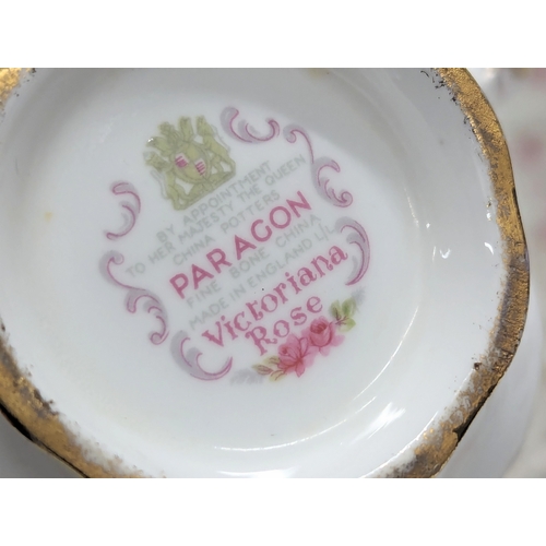 673 - A Paragon 'Victoriana Rose' pottery tea service, including cake plate.