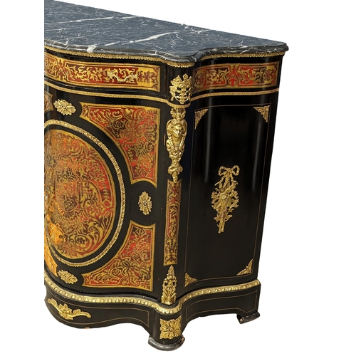 1122 - A Victorian style serpentine front profusely brass inlaid credenza with marble top and gilded brass ... 