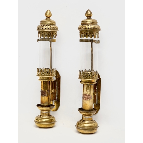 63 - A pair of Early 20th Century Great Northern Railway brass carriage lamps. 35cm