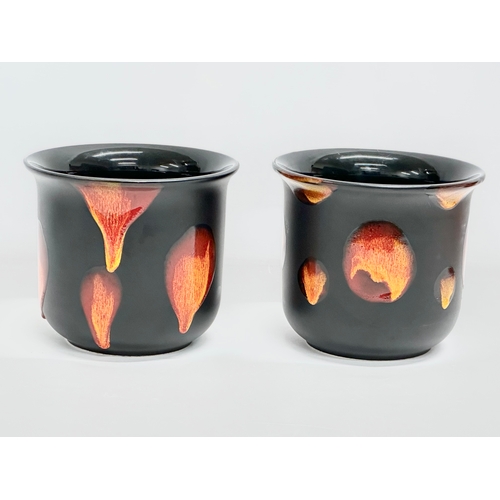 70 - A pair of Poole Pottery ‘Galaxy’ jardinières/planters. 17x15cm