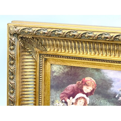 421 - A large good quality Carvers & Gilders gilt framed print. 57x9x67cm