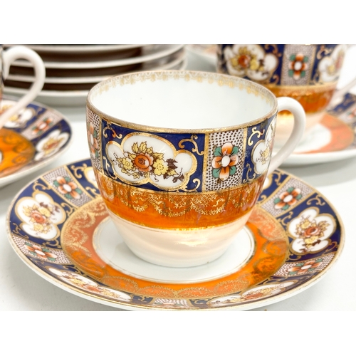 106 - An Early 20th Century 34 piece Beyer & Boch Imari pattern tea service. Circa 1905-1931. 2 cake plate... 