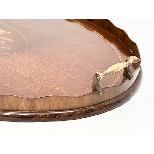 107 - A Sheraton Revival inlaid mahogany serving tray. Late 19th/Early 20th Century. Circa 1890-1910. 63x4... 