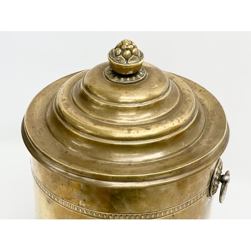 112 - An Early 20th Century brass coal bin. 32x33x45cm