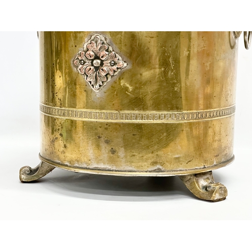 112 - An Early 20th Century brass coal bin. 32x33x45cm