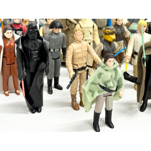 408 - A collection of 1970’s/80’s Star Wars action figures and weapons.