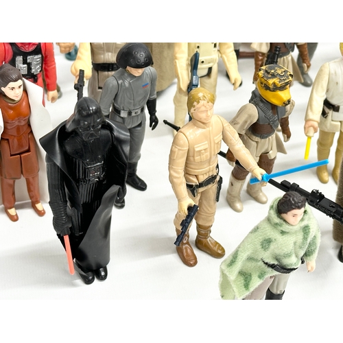 408 - A collection of 1970’s/80’s Star Wars action figures and weapons.