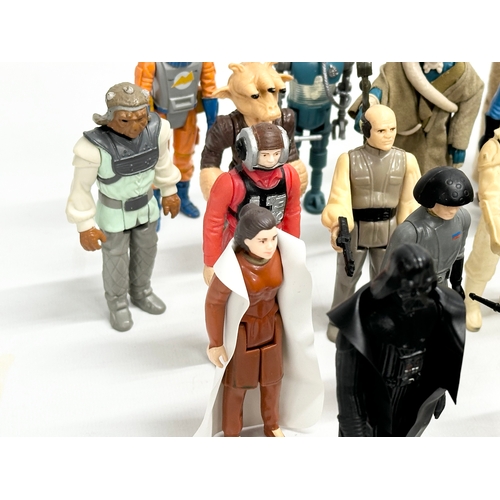 408 - A collection of 1970’s/80’s Star Wars action figures and weapons.