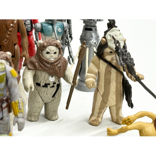 408 - A collection of 1970’s/80’s Star Wars action figures and weapons.