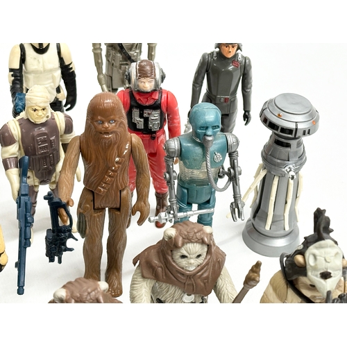 408 - A collection of 1970’s/80’s Star Wars action figures and weapons.