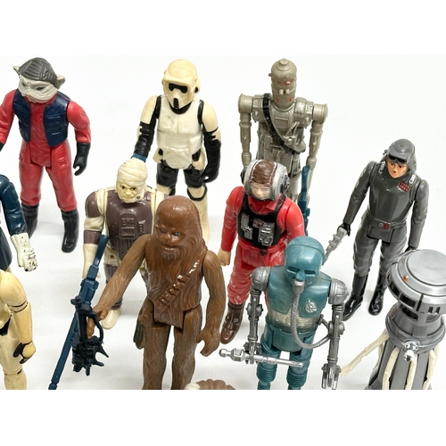 408 - A collection of 1970’s/80’s Star Wars action figures and weapons.