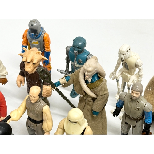 408 - A collection of 1970’s/80’s Star Wars action figures and weapons.