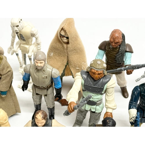 408 - A collection of 1970’s/80’s Star Wars action figures and weapons.