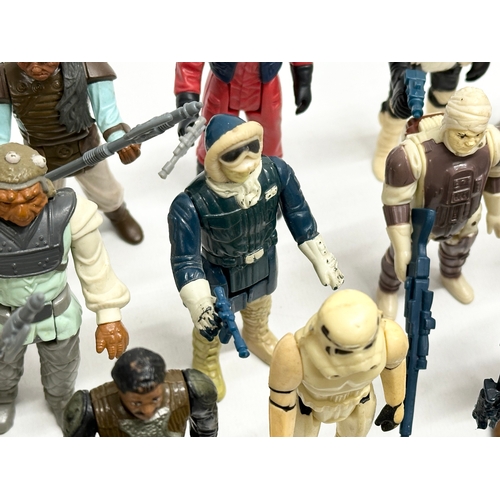 408 - A collection of 1970’s/80’s Star Wars action figures and weapons.