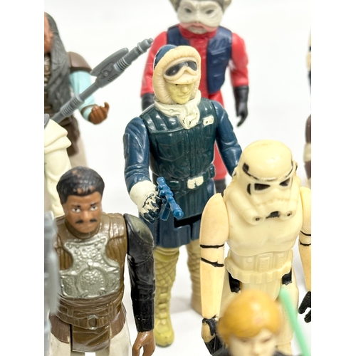 408 - A collection of 1970’s/80’s Star Wars action figures and weapons.