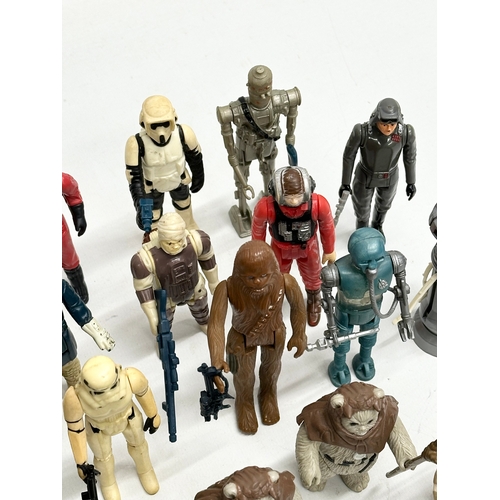 408 - A collection of 1970’s/80’s Star Wars action figures and weapons.